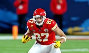 Travis Kelce playing for the Kansas City Chiefs as a tight end in the NFL